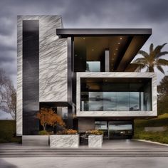 a modern house with large windows and white marble