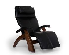 the reclining chair is black leather and has wooden legs