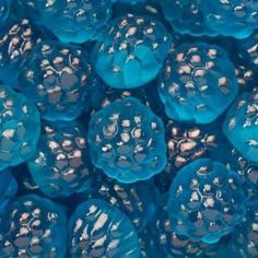 many blue bubbles are shown in this close up photo