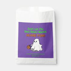 a bag with a ghost on it that says, don't let the real halloween scare you