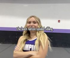 a girl standing with her arms crossed in front of the camera and text that reads, the least reason spoiled slinking