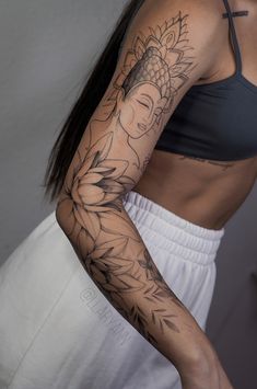 a woman with a tattoo on her arm