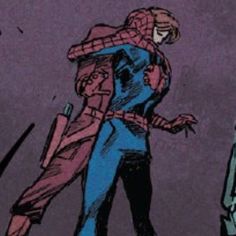 the spider - man and his companion appear to be hugging in front of each other