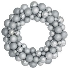 a wreath made out of silver and white ornaments