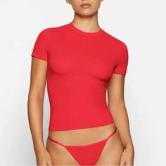 Ruby Red Tee In Size 3x By Skims. Polyamide/Elastane. Nwt. Fitted Red Crew Neck Top, Fitted Red T-shirt For Summer, Red Stretch Basic T-shirt, Basic Stretch Red T-shirt, Red Fitted Crew Neck T-shirt, Green Cropped Hoodie, Ruby Color, Square Neck Bodysuit, Mesh T Shirt