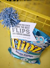 a bag of flips sitting on top of a yellow shelf next to a sign