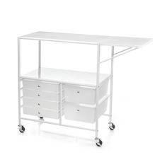 a white cart with drawers and wheels on the bottom is shown in front of a white background