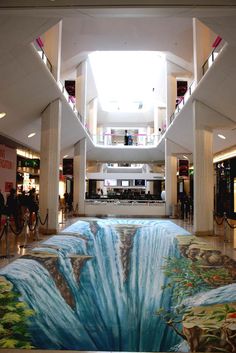 the floor is painted with an image of a waterfall