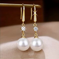 Brand New Women's Hanging Pearl & Diamond Earrings 18k Gold Plated Sterling Silver Genuine 2ct Lab Created Diamonds Real Natural Freshwater Pearls Measurements 1.7" H X 12mm Retail Price $350 Buy With Confidence From A Trusted Seller W/ A 99%+ Feedback Rating! A0239 (Id-730-) Classic White Gold Plated Earrings, Elegant Aaa Quality Drop Earrings, Elegant White Diamond Earrings, Classic Cubic Zirconia Earrings, White Diamond Dangle Earrings For Pierced Ears, Elegant Diamond White Bridal Earrings As Gift, Elegant Diamond White Bridal Earrings, Classic Pearl White Cubic Zirconia Earrings, Diamond Dangle Pearl Earrings As Gift