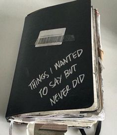 a black book with writing on it that says things i wanted to say but never did