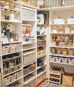 an organized pantry with lots of baskets and other items on shelves in the closet area