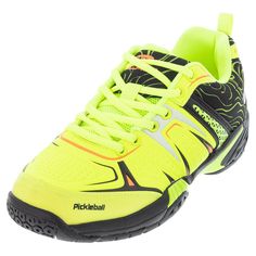 a pair of yellow and black tennis shoes