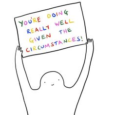 a person holding up a sign that says you're doing really well given the circumtances