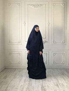 Navy blue silk long khimar with high cuffs. This jilbab will be a good cover for you. Delicate fine silk ideal for summer weather. Always keep in mind that the fabric is enlightened, at the bottom have to be the dress. An elegant way for the believing women. Buttons secure the cuffs. Be sure when ordering in the note write the length of the khimar and the girth of the wrist.We can sew khimar in any other color!This handy headdress like those who do not yet know how to wind a scarf, busy mums and Bridesmaid Dresses Hijab, Abaya Fashion Dubai, Dresses Hijab, Hijab Wedding Dresses, Casual Attire For Women, Disney Wedding Dresses, Dubai Abaya, Street Hijab Fashion, Wedding Dress Pictures