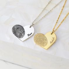 "► Heart Sideways Fingerprint Necklace This heart fingerprint necklace is a perfect way to keep your loved one always close to your heart. It also will can be a beautiful memorial keepsakes for a Mommy or Grandma gift using the children or grandchildren's prints. * Material: Solid 925 Sterling Silver * Finishing: Silver - Yellow Gold - Rose Gold * Dimensions: Pendant measures approx. 5/8\" x 3/4\" * Character limits: 1 words * Necklace length: You can choose up to 24 inches (includes pendant's length) * By default, silver items comes with BLACK engraving and gold-plated item comes with CLEAR engraving. ► HOW TO ORDER & ADD PERSONALIZATION * If you want engraving on one side of the charm, choose ONE SIDED. If you want engravings on both sides, choose TWO SIDED. * Add the item to cart and ch Heart Fingerprint, Fingerprint Necklace, Word Necklace, Condolence Gift, Fingerprint Jewelry, Clay Necklace, Grandma Gift, Memorial Keepsakes, Memorial Jewelry