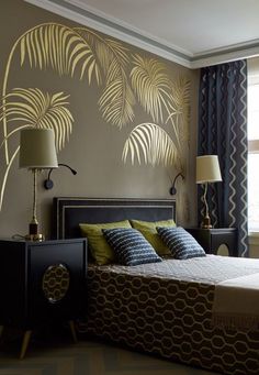 a bed room with a neatly made bed next to a night stand and two lamps