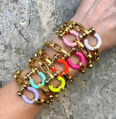 These bracelets are perfect as a stand-alone statement or for mixing in with your personal collection. I've been making them since 2020! Over that substantial time period, the clasp colors vary, sell out, etc. so I decided it was time for a new listing.  Please note sizing info, below.  The beautiful, gold filled  enamel focal piece is a strong, well-made working clasp--clasp bar unscrews to thread link end to fasten. Now offered in black, purple and light blue. Please note that the mint green i Acrylic Bracelet, Rainbow Bracelet, Clasp Bracelet, Chunky Bracelets, Genuine Turquoise, Bracelet Clasps, Lightning Bolt, Gold Plated Chains, Jewelry Pouch