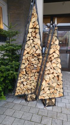 there are two trees made out of firewood