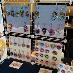 there are many earrings on display in the store