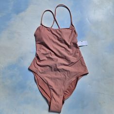 Light Pink Peach Colored High Leg One-Piece Swimsuit, Bathing Suit. Brand New With Tags & Inner Liner, Never Tried On. Basic One Piece With Plain Front, Criss Cross Back Straps, Has Criss Crossing At Back That Is Sexy & Stylish. Size M. Brand Is Pacsun. Perfect For The Beach & Pool. Very Flattering Style & Cut, High Leg Cut. See Photos For The Best Visual Reference. All Sales Are Final. Ready To Ship. Pink Stretch Bodysuit For Poolside, Pink Stretch One-piece Swimsuit For Vacation, Pink Stretch Vacation Swimsuit, Pink Stretch One Piece For Vacation, Pink Stretch One-piece For Vacation, Pink Stretch Sleeveless One Piece, Pink One-piece Swimsuit For Beach Season, Pink One Pieces For Poolside Summer, Stretch Pink One Piece For Spring