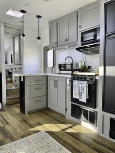 the kitchen is clean and ready for us to use in its new owner's home