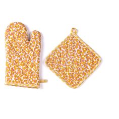 an oven mitt and pot holder are shown on a white background with orange dots