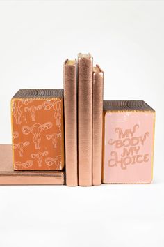 three books stacked on top of each other with the words my body is my choice printed on them