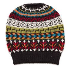 a knitted hat with multicolored patterns on the front and side, against a white background