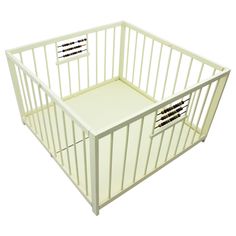 a white baby crib with two drawers