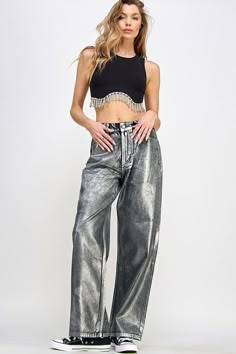 Introducing The Metallic Jean, a luxurious twist on a classic wardrobe staple. Crafted from metallic silver denim, these on-trend jeans offer the perfect balance of style and comfort. With flattering silhouettes, belt loops, five pockets, and a front button closure, they bring timeless sophistication into any look. Black And Silver Outfits, Matrix Fashion, Style Development, Trend Jeans, Japan Outfits, Silver Outfits, Unique Jeans, Sparkle Outfit, Silver Pants