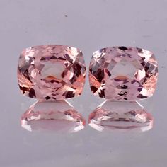 AAA Flawless 16 x 12 mm Natural  Peach Padparadscha Sapphire Loose Cushion Cut Pair 36.00 Ct Gemstone Ring And Jewelry Making GIT Certified GEMSTONE SPECIFICATION :- TOTAL CARAT WEIGHT = 36.00 CT LENGTH = 16.00 MM WIDTH = 12.00 MM DEPTH = 9.10  MM DIMENSION = 16.00 x 12.00 x 9.10 MM PRODUCT DETAILS THEY ARE SYMBOLIC. FOR THE MOST PART, THE PEACH PADPARADSCHA SAPPHIRE IS USED TO SYMBOLIZE OPEN COMMUNICATION AND CLARITY OF THOUGHT. APART FROM THIS, THE STONE IS ALSO ASSOCIATED WITH LOVE, TRUTH, FAITH AND COMMITMENT. THESE REPRESENTATIONS HAVE MADE THE JEWEL A POPULAR GIFT AMONG COUPLES. PEACH PADPARADSCHA SAPPHIRE IS A UNIQUE AND SPECIAL VARIETY OF CORUNDUM THAT FEATURES TWO OF NATURE'S MOST MAJESTIC COLORS: DEEP OCEAN BLUE AND VIVACIOUS GREEN ANOTHER NAME THAT IS WIDELY USED TO DESCRIBE PEA Peach Sapphire, Open Communication, Padparadscha Sapphire, Black Spot, Cushion Cut, Gemstone Ring, 9 And 10, Blue Sapphire, Topaz