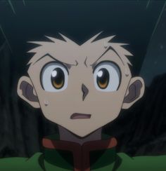 an anime character with big eyes staring at the camera in front of a dark background