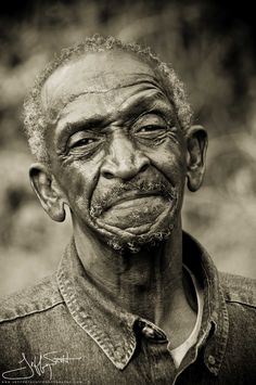 an old man with wrinkles on his face