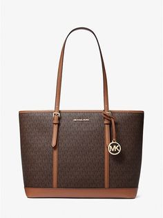 100% AUTHENTIC Brand New With Tags  Michael Kors Jet Set Travel TZ Tote  Style: 35T0GTVT3V  Color: Brown mk  Signature coated canvas with leather trim Inside zip and multifunction pockets Zip-top closure, fabric lining Adjust Leather Handles with 9" -11"drop Hanging MK medallion logo circle charm Gold tone hardware Approx.: 14" at the bottom---17" at the top (L) x 11 1/2" (H) x 6.25" (W) Retail price: $398 SHIPPING : We ship out within 1-2 business day once the payment is cleared through PAYPAL. Shipping within USA, Signature Confirmation is Required Upon Delivery for item that is over $250. INTERNATIONAL SHIPPING IS COST VARIES BY BUYER LOCATION AND COUNTRY. WE SHIP TO WORLDWIDE by UPS FEDEX, USPS PRIORITY AND EXPRESS mail through EBAY &PAYPAY protection with tracking number ONLY INTERNAT Logo Tote Bag, Best Purses, Michael Kors Crossbody Bag, Travel Tote Bag, Bags Logo, Zip Wallet, Travel Tote, Shoulder Tote Bag, Kors Jet Set