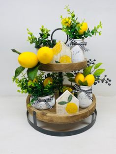 three tiered tray with lemons and cheese