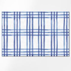 a blue and white checkered wall hanging