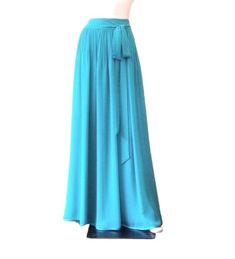 "It is made from soft and good quality Chiffon fabric. This is made to order in your measurements. Skirt length: 38\" .It can be made longer or shorter. It is made with a zipper. You can choose other color from the color chart. When you order please give me your measurements: 1: The length of skirt from the top of the waistline to bottom hem . 2: Waist ( where you want the waistline to be) . 3: Hips ( around the fullest part) 4: And your color choice. Tailoring time: 1-2 weeks before shipping. C Flowy Light Blue Party Skirt, Long Summer Skirt For Bridesmaid, Light Blue Flowy Skirt For Party, Flowy Blue Party Skirt, Blue Flowy Party Skirt, Flowy Blue Maxi Skirt With Gathered Details, Blue Flowy Skirt For Party, Elegant Blue Maxi Skirt, Blue Chiffon Lined Skirt