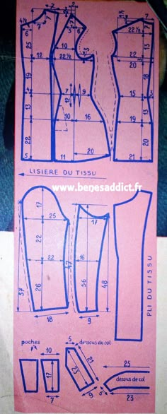 an image of a sewing pattern for a top and pants on a pink paper with blue ink