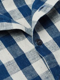 Story Mfg.'s 'Uniform' shirt is made from handloomed organic cotton in a gingham check with alternative patchworking along the hem, it varies for each design, so you're getting something unique. It's cut for a comfortable fit with a classic convertible collar and embroidered with the logo on the chest pocket. Lower Impact Materials. This product is made using at least 50% lower-impact materials or ingredients. Responsible Craftsmanship. This product promotes artisanal skill and brands that inve… Classic Convertible, Madras Shirt, Story Mfg, Shop Story, Tom Ford Bag, Uniform Shirt, Convertible Collar, Patchwork Shirt, Jacquard Shirt