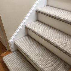 the carpeted stairs are clean and ready for us to use