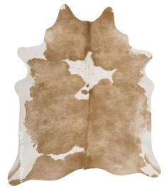 a brown and white cowhide rug on a white background