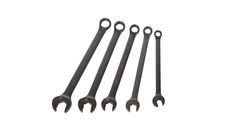 four wrenches are shown on a white background