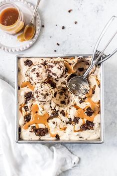 an ice cream sundae with caramel drizzled on top