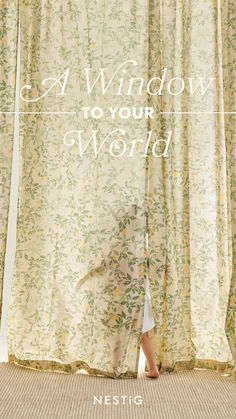 a woman standing in front of a curtain with the words, a window to your world