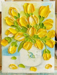 a painting of yellow tulips in a white vase