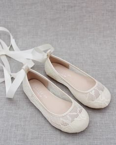 Chic and vintage lace ballerina flats with satin ribbon lace up. Great for flower girls, wedding party or any parties. We can also do this style with ankle strap only (separate listing coming soon). If your sizes are not available, please message us and we will help when sizes are available. DETAILS:COLORS AVAILABLE: Ivory, White, Blush, Navy and Pink satinUPPER: Synthetic upper and liningMATERIALS: Mandmade outsoleORIGIN: Imported STYLE NAME: ZOE White Ballerina Shoes, White Lace Flats, Christening Shoes, Lace Up Ballet Flats, Flower Girl Shoes, Lace Flats, Girls Flats, Wedding Shoes Flats, Ballerina Shoes