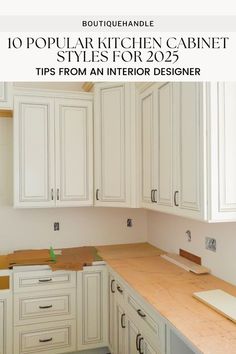 a kitchen with white cabinets and wood counter tops in an interior designer's home