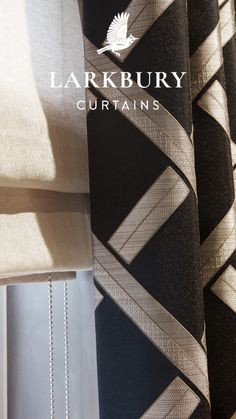 the logo for larkburn curtain company is shown in front of curtains with black and white designs