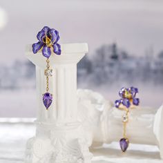 Inspired by Vincent Van Gogh's "Irises", these iris earrings showcases the power and tension of life, with petal gestures in the style of Van Gogh's paintings. Made from sterling silver and purple enamel, each earring is an eye-catching piece to complement your ears. Celebrate the timeless beauty of the iris flower with this stunning ring. Treat yourself as a holiday gift with this masterpiece.Carat Weight: 3.8 ctStone Size: 3,3*5,5*8 mmNumber of Stones: 6 Stone Color: Diamond White, Citrine Yel Iris Flower Jewelry, Iris Earrings, Iris Jewelry, Artsy Accessories, Iris Ring, Orchid Jewelry, Silver Earrings Online, Bridal Diamond Necklace, Van Gogh Irises