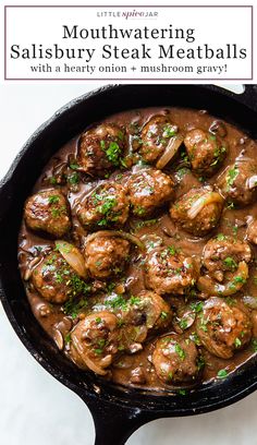 a skillet filled with meatballs covered in gravy